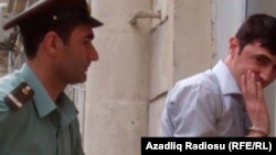 Azerbaijan -- Jailed Azerbaijani oppostion activist Tural Abbasli at court, Baku, 19Sep2011